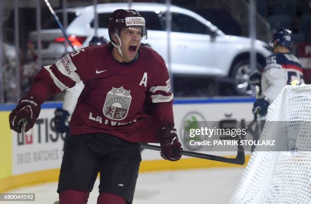 Latvia´s Janis Spruckts celebrates scoring during IIHF Icehockey world championship first round match between Latvia and Slovakia in the LANXESS...