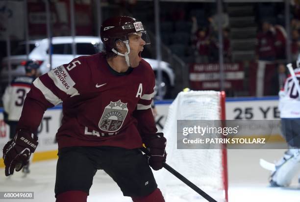 Latvia´s Janis Spruckts celebrates scoring during IIHF Icehockey world championship first round match between Latvia and Slovakia in the LANXESS...