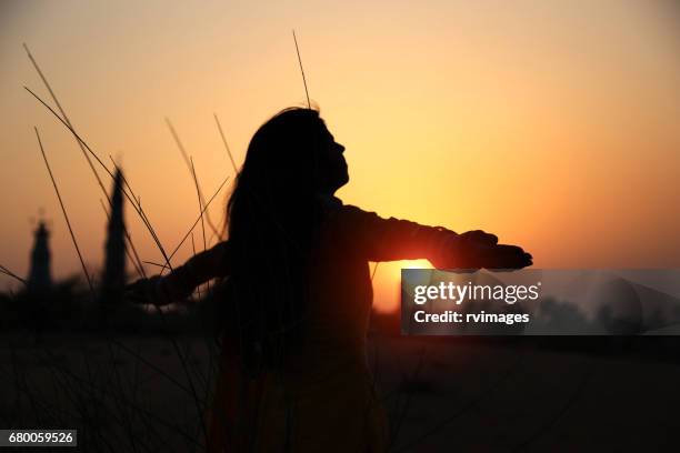 freedom in the nature - quiet gesture stock pictures, royalty-free photos & images