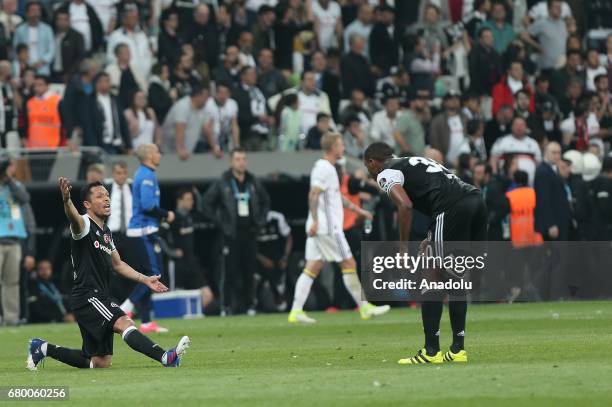 Adriano and Marcelo of Besiktas react after the Turkish Spor Toto Super Lig soccer match between Besiktas and Fenerbahce at Vodafone Arena in...