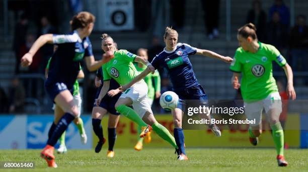 Bianca Schmidt of Turbine Potsdam battles for the ball with Alexandra Popp of VfL Wolfsburg during the Allianz Women's Bundesliga match between...