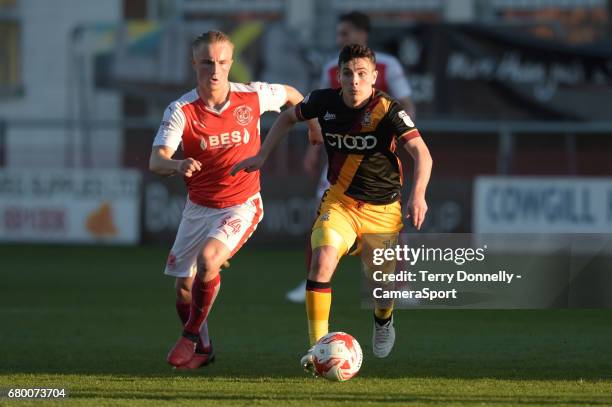 Bradford City's Josh Cullen battles with Fleetwood Town's Kyle Dempsey during the Sky Bet League One Play-Off Semi-Final Second Leg match between...