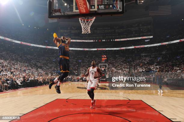 LeBron James of the Cleveland Cavaliers goes up for a dunk against the Toronto Raptors during Game Four of the Eastern Conference Semifinals of the...