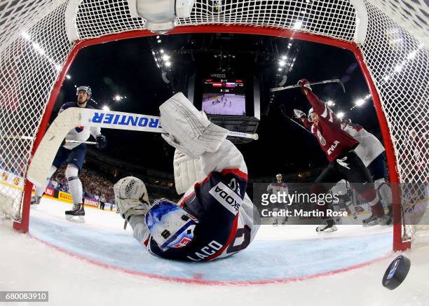 Miks Indrasis of Latvia celebrates the opening goal during the 2017 IIHF Ice Hockey World Championship game between Latvia and Slovakia at Lanxess...