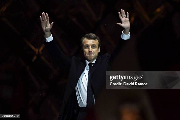 Leader of 'En Marche !' Emmanuel Macron addresses supporters after winning the French Presidential Election, at The Louvre on May 7, 2017 in Paris,...