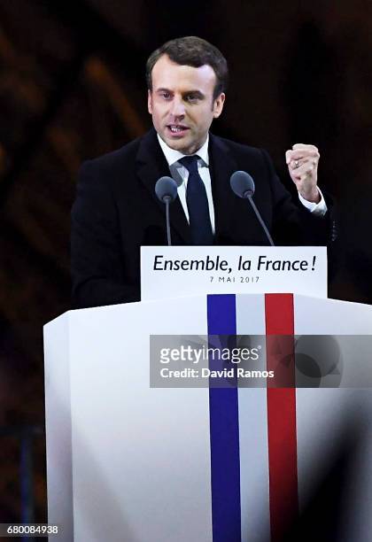 Leader of 'En Marche !' Emmanuel Macron addresses supporters after winning the French Presidential Election, at The Louvre on May 7, 2017 in Paris,...