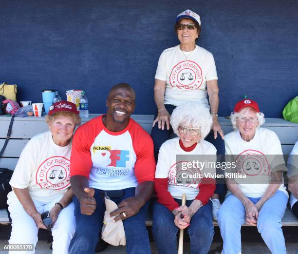 Terry Crews poses with original members of the All American Girls Professional Baseball League Dolly Konwinski, Suzanne Zipay, Maybelle Blair and...