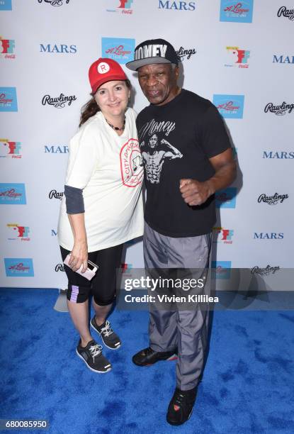 Tracy Reiner and Floyd Mayweather Sr attend "A League of Their Own" 25th Anniversary Game at the 3rd Annual Bentonville Film Festival on May 7, 2017...