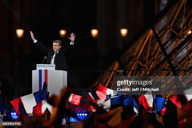 Leader of 'En Marche !' Emmanuel Macron addresses supporters after winning the French Presidential Election, at The Louvre on May 7, 2017 in Paris,...