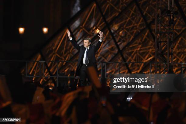 Leader of 'En Marche !' Emmanuel Macron addresses supporters after winning the French Presidential Election, at The Louvre on May 7, 2017 in Paris,...