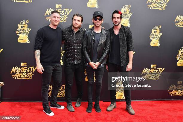 Musicians Zack Merrick, Rian Dawson, Alex Gaskarth and Jack Barakat of All Time Low attend the 2017 MTV Movie and TV Awards at The Shrine Auditorium...