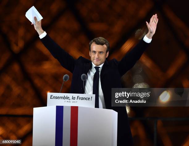 French presidential election candidate for the 'En Marche!' political movement, Emmanuel Macron greets after winning the 2017 French election at the...
