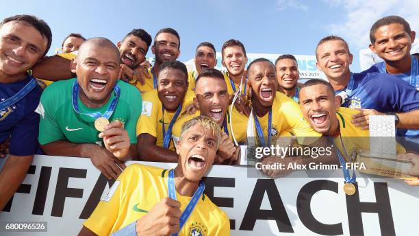 Team captain Bruno Xavier and team mates celebrate with the trophy after they won the FIFA Beach Soccer World Cup Bahamas 2017 final between Tahiti...