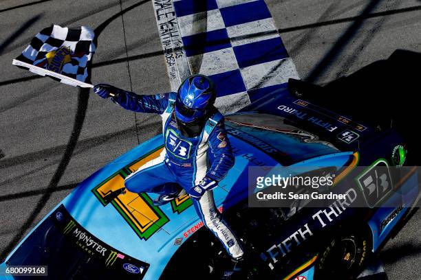 Ricky Stenhouse Jr., driver of the Fifth Third Bank Ford, celebrates wnning the Monster Energy NASCAR Cup Series GEICO 500 at Talladega Superspeedway...