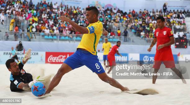 Bruno Xavier of Brazil looks to beat Jonathan Torohia of Tahati during the FIFA Beach Soccer World Cup Bahamas 2017 final between Tahiti and Brazil...