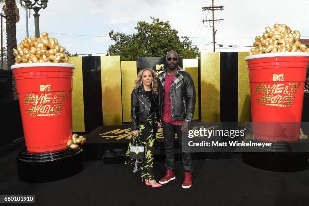 Iva Colter and actor Mike Colter attend the 2017 MTV Movie And TV Awards at The Shrine Auditorium on May 7, 2017 in Los Angeles, California.