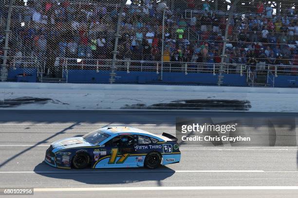 Ricky Stenhouse Jr., driver of the Fifth Third Bank Ford, celebrates wnning the Monster Energy NASCAR Cup Series GEICO 500 at Talladega Superspeedway...