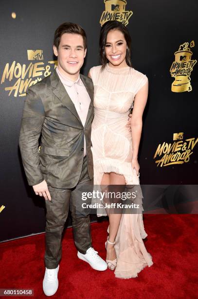 Host Adam DeVine and actor Chloe Bridges attend the 2017 MTV Movie And TV Awards at The Shrine Auditorium on May 7, 2017 in Los Angeles, California.