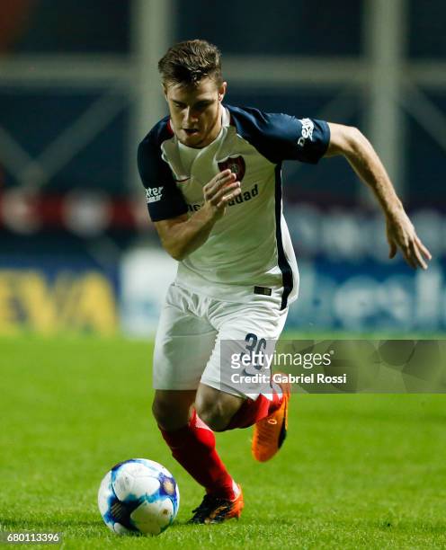 Bautista Merlini of San Lorenzo drives the ball during a match between San Lorenzo and Rosario Central as part of Torneo Primera Division 2016/17 at...