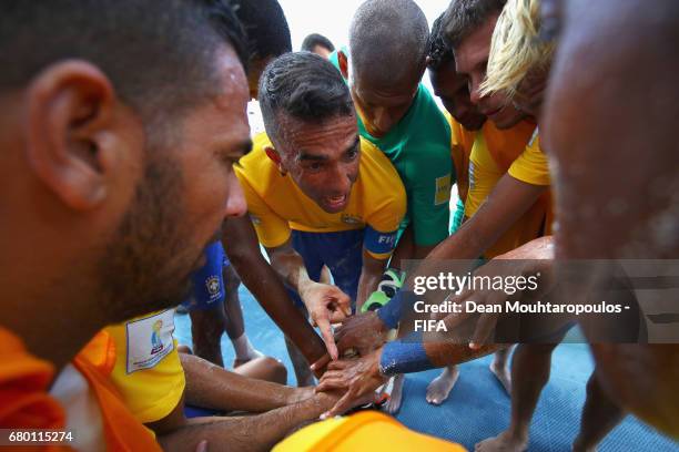 Captain, Bruno Xavier of Brazil speaks to his players during the FIFA Beach Soccer World Cup Bahamas 2017 final between Tahiti and Brazil at National...