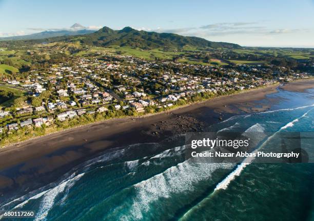 aerial view overlooking at oakura beach, new plymouth, new zealand. - new zealand beach house stock pictures, royalty-free photos & images