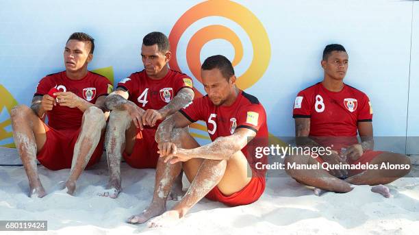 Tearii Labaste, Heimanu Taiarui , Raimoana Bennett and Heiarii Tavanae of Tahiti react after losing during the FIFA Beach Soccer World Cup Bahamas...
