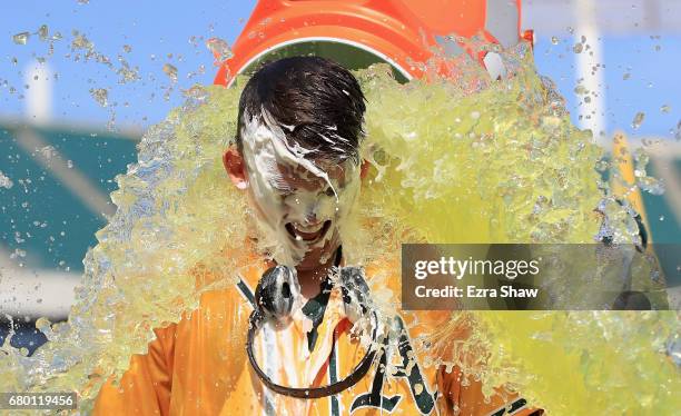 Ryon Healy of the Oakland Athletics is covered in Gatorade after he hit a walk-off home run in the ninth inning against the Detroit Tigers at Oakland...