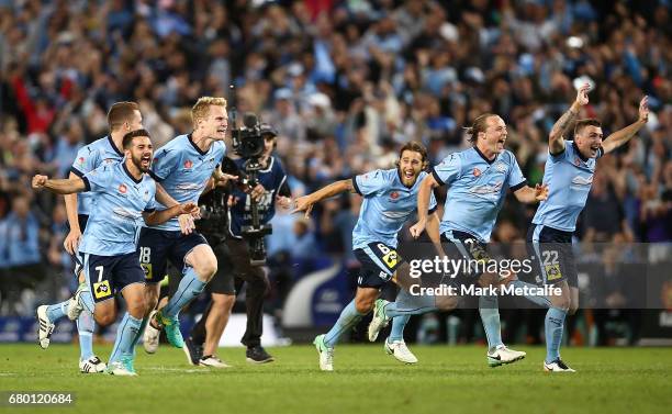 Sydney FC players celebrate winning the 2017 A-League Grand Final match between Sydney FC and the Melbourne Victory at Allianz Stadium on May 7, 2017...