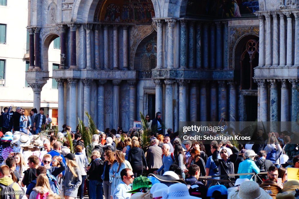 Close Up on crowds at San Marco Basilica, Palm Sunday, Venice, Italy