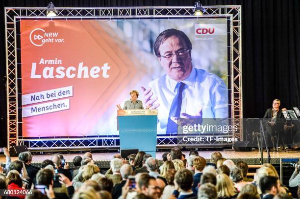 German Chancellor and Chairwoman of the German Christian Democrats Angela Merkel speaks during the CDU campaign rally for state elections in North...