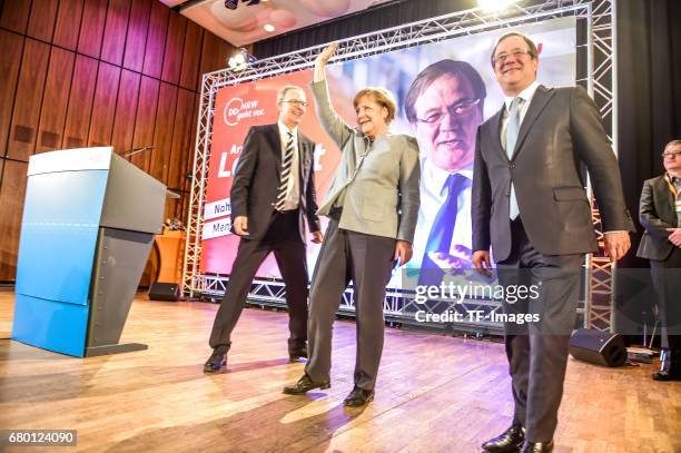 German Chancellor and Chairwoman of the German Christian Democrats Angela Merkel and Armin Laschet, local German Christian Democrats lead candidate,...