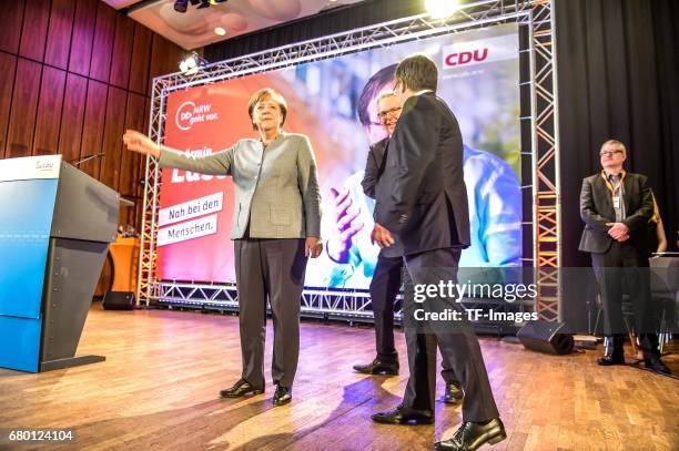 German Chancellor and Chairwoman of the German Christian Democrats Angela Merkel and Armin Laschet, local German Christian Democrats lead candidate,...