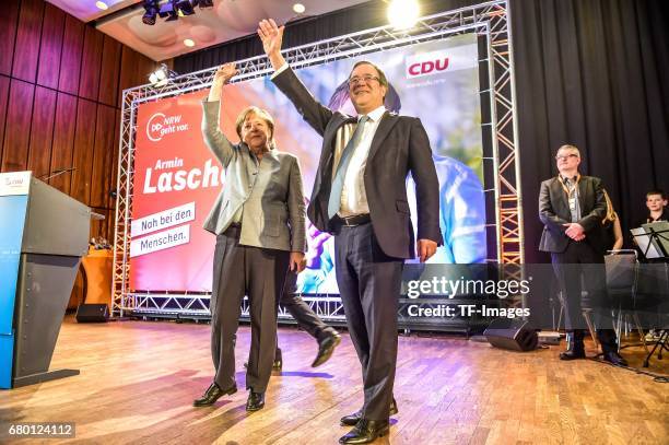 German Chancellor and Chairwoman of the German Christian Democrats Angela Merkel and Armin Laschet, local German Christian Democrats lead candidate,...