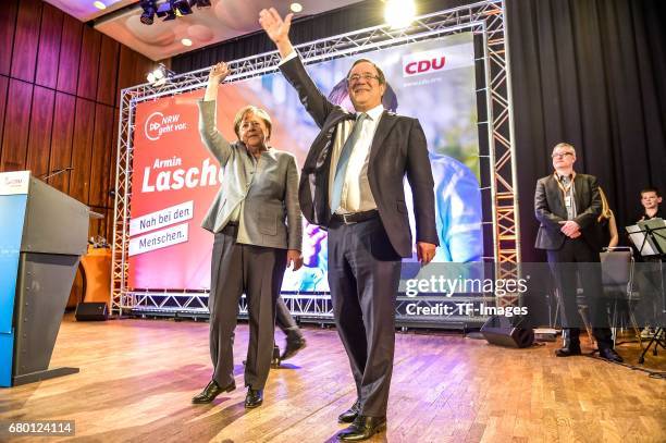 German Chancellor and Chairwoman of the German Christian Democrats Angela Merkel and Armin Laschet, local German Christian Democrats lead candidate,...