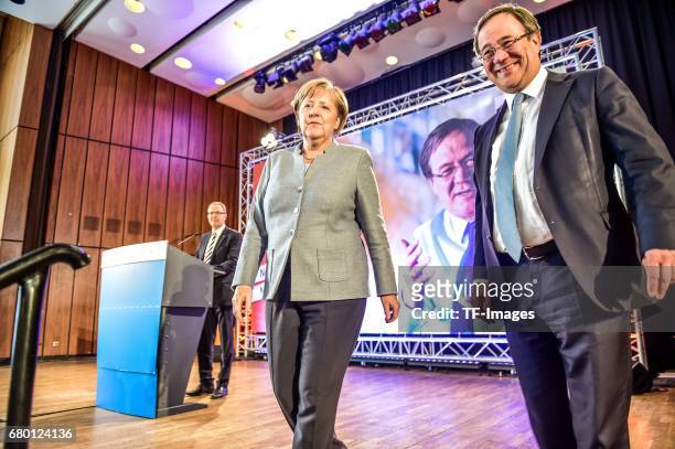 German Chancellor and Chairwoman of the German Christian Democrats Angela Merkel and Armin Laschet, local German Christian Democrats lead candidate,...