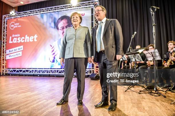 German Chancellor and Chairwoman of the German Christian Democrats Angela Merkel and Armin Laschet, local German Christian Democrats lead candidate,...