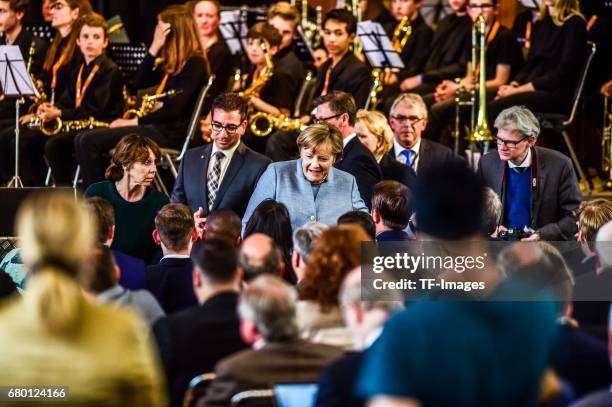 German Chancellor and Chairwoman of the German Christian Democrats Angela Merkel looks on during the CDU campaign rally for state elections in North...