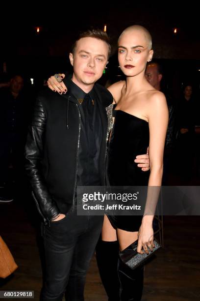 Actors Dane DeHaan and Cara Delevingne attend the 2017 MTV Movie And TV Awards at The Shrine Auditorium on May 7, 2017 in Los Angeles, California.