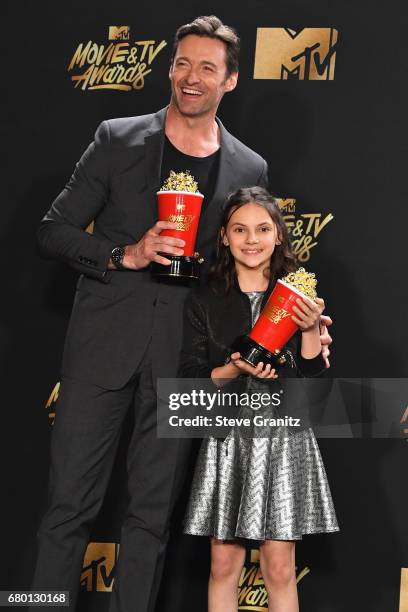 Actors Hugh Jackman and Dafne Keen pose in the press room at the 2017 MTV Movie and TV Awards at The Shrine Auditorium on May 7, 2017 in Los Angeles,...