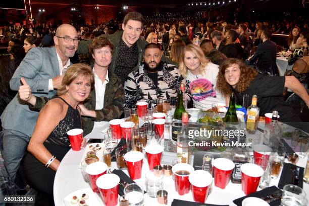 Penny DeVine, Dennis DeVine, actor Anders Holm, host Adam DeVine, DJ Khaled, actor Jillian Bell, and actor Blake Anderson attend the 2017 MTV Movie...