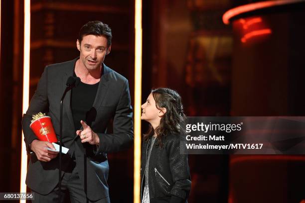 Actors Hugh Jackman and Dafne Keen speak onstage at the 2017 MTV Movie And TV Awards at The Shrine Auditorium on May 7, 2017 in Los Angeles,...