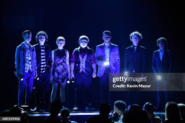 Actors Jaeden Lieberher, Finn Wolfhard, Sophia Lillis, Jeremy Ray Taylor, Chosen Jacobs, Wyatt Oleff, and Jack Dylan Grazer pose onstage during the...