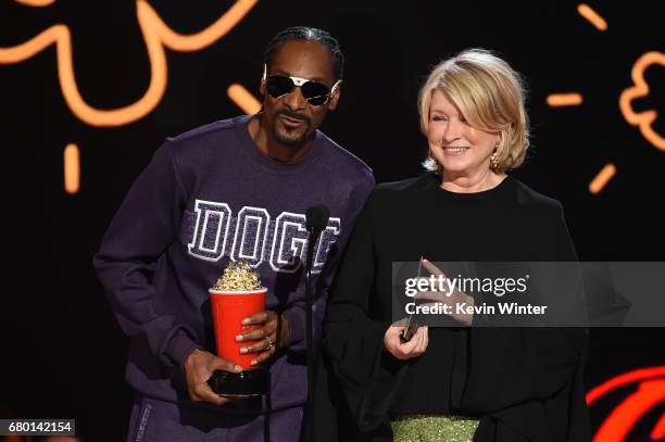 Rapper Snoop Dogg and Martha Stewart speak onstage during the 2017 MTV Movie And TV Awards at The Shrine Auditorium on May 7, 2017 in Los Angeles,...