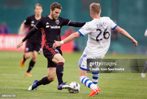 United forward Patrick Mullins dribbles past Montreal Impact defender Kyle Fisher during a MLS game between DC United and the Montreal Impact on May...