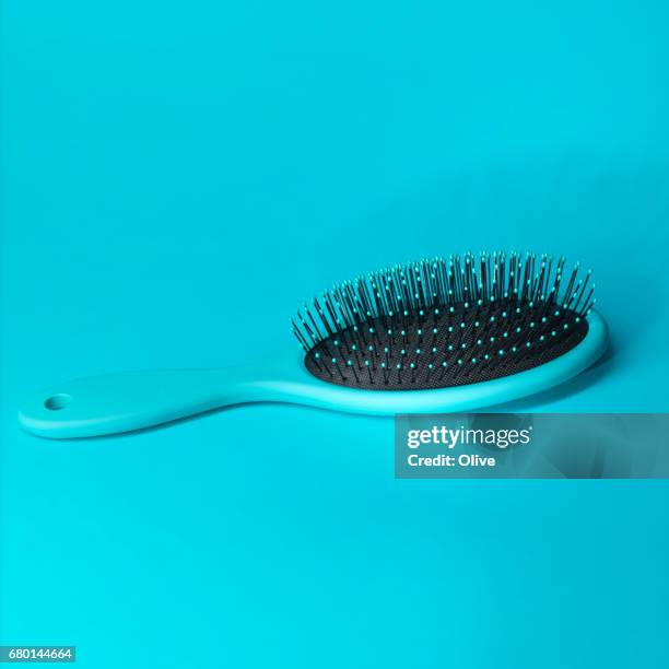 blue hairbrush on blue background with pocket mirror - bleu clair stock pictures, royalty-free photos & images