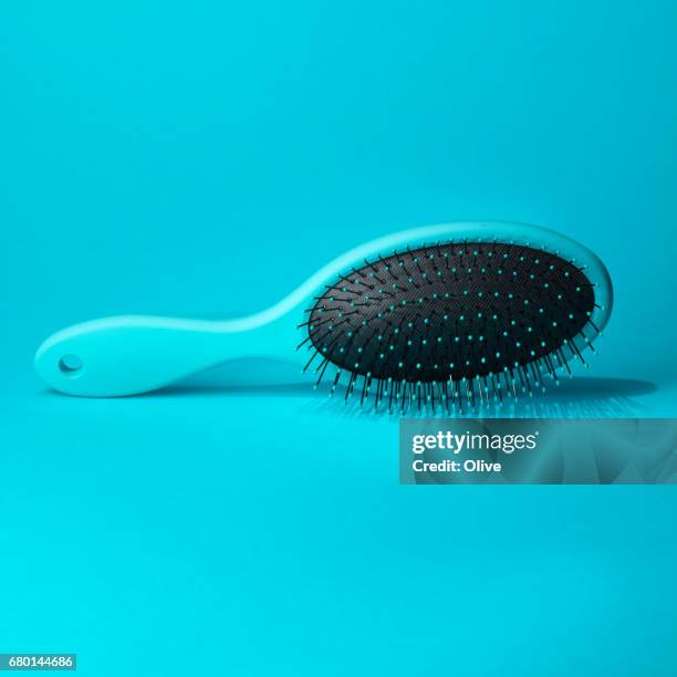 blue hairbrush on blue background with pocket mirror - bleu clair stock pictures, royalty-free photos & images