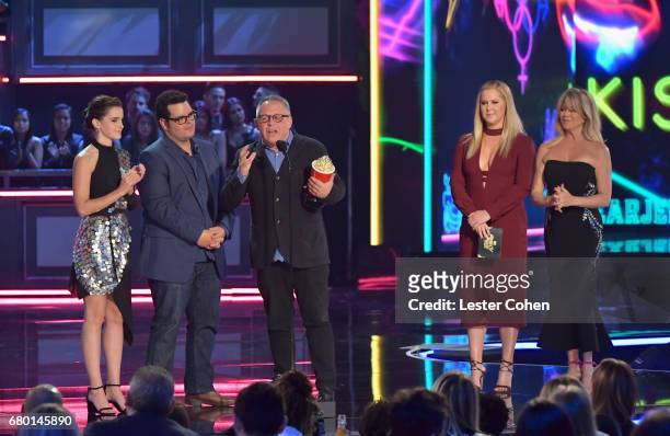 Actor Emma Watson, actor Josh Gad and director Bill Condon accept the Movie of the Year award from presenters Amy Schumer and Goldie Hawn onstage...