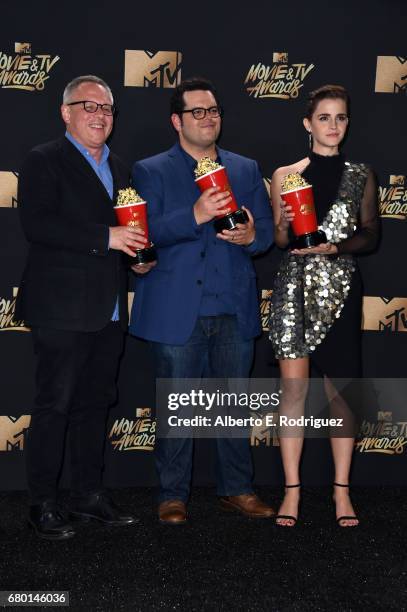 Director Bill Condon and actors Josh Gad and Emma Watson, winners of Movie of the Year for 'Beauty and the Beast', pose in the press room during the...