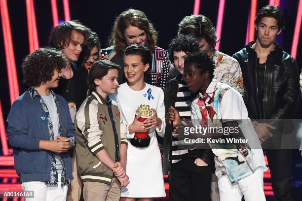 The cast of 'Stranger Things' accepts Show of the Year onstage during the 2017 MTV Movie And TV Awards at The Shrine Auditorium on May 7, 2017 in Los...