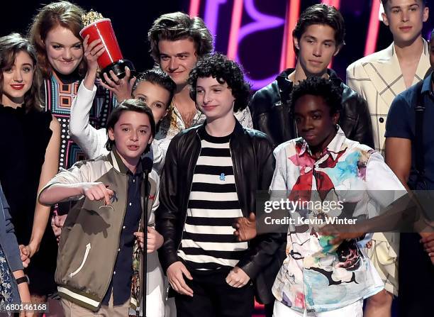 The cast of 'Stranger Things' accepts Show of the Year onstage during the 2017 MTV Movie And TV Awards at The Shrine Auditorium on May 7, 2017 in Los...